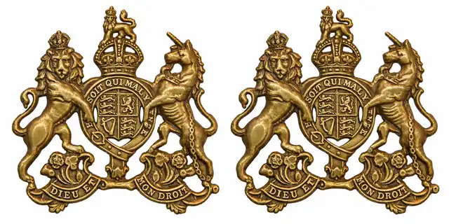 Pair of General Service Corps brass Royal Arms collar badges