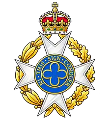 Cap badge: silver Maltese cross with blue quatrefoil centre, motto IN THIS SIGN CONQUER, gold wreath and crown.