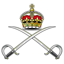 RAPTC badge: a crown above crossed silver sabres, the badge of the Royal Army Physical Training Corps.