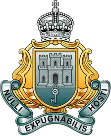 Royal Gibraltar Regiment badge: castle and key shield with crown above and Nulli Expugnabilis Hosti motto.