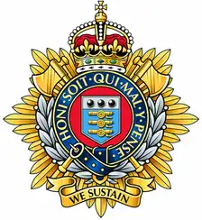 RLC badge: crown above a garter circlet and shield of cannonballs, on gold laurel with a We Sustain scroll.