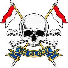The Royal Lancers cap badge: skull and crossed bones on crossed lances with the Or Glory scroll.